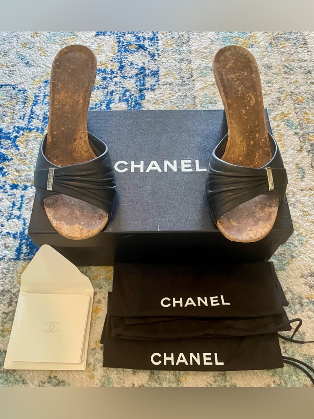 CHANEL Authentic Black Leather Cork Slide Sandals with Silver Logo Accent